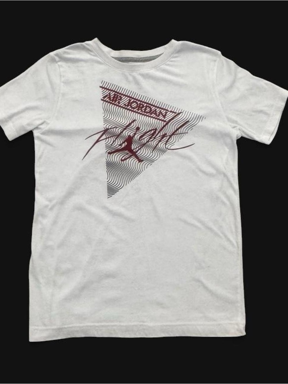 White Jordan kids t-shirt with red Air Jordan logo and 'Flight' text, size L